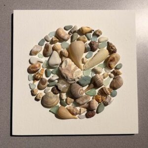 The Things of Earth Series XVIII, painted wood, rock, sea glass, shells. 12” X 12.” The sea shells were gifted to me by Jack Kiburz.