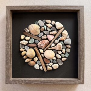 The Things of Earth Series XIX, painted wood, rock, sea glass, shells. 12” X 12.” The sea shells were gifted to me by Jack Kiburz.