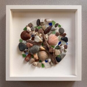 The Things of Earth Series XX, painted wood, drift wood, rock, sea glass, shells. 12” X 12.”